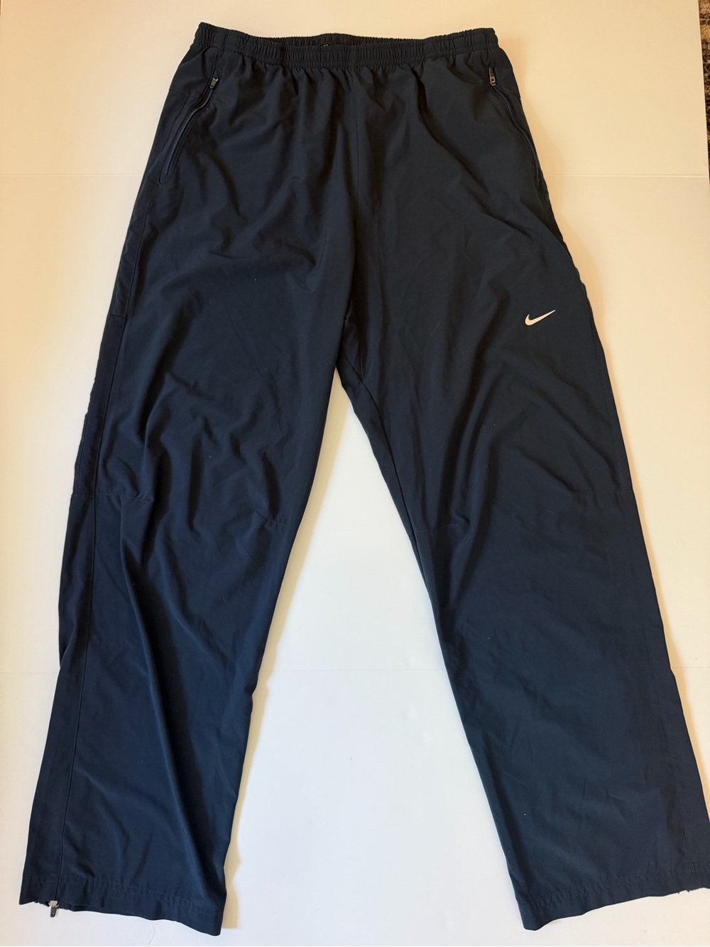 Nike Men's Navy Blue Track Pants with White Swoosh
